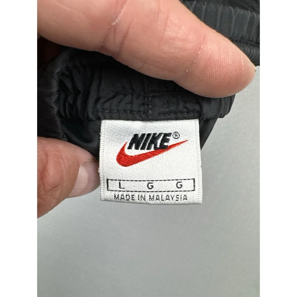 Vintage 90s Nike Black Nylon Track Pants Swoosh Zip Leg Windbreaker L